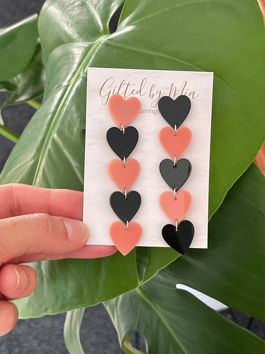 pink and black heart earrings