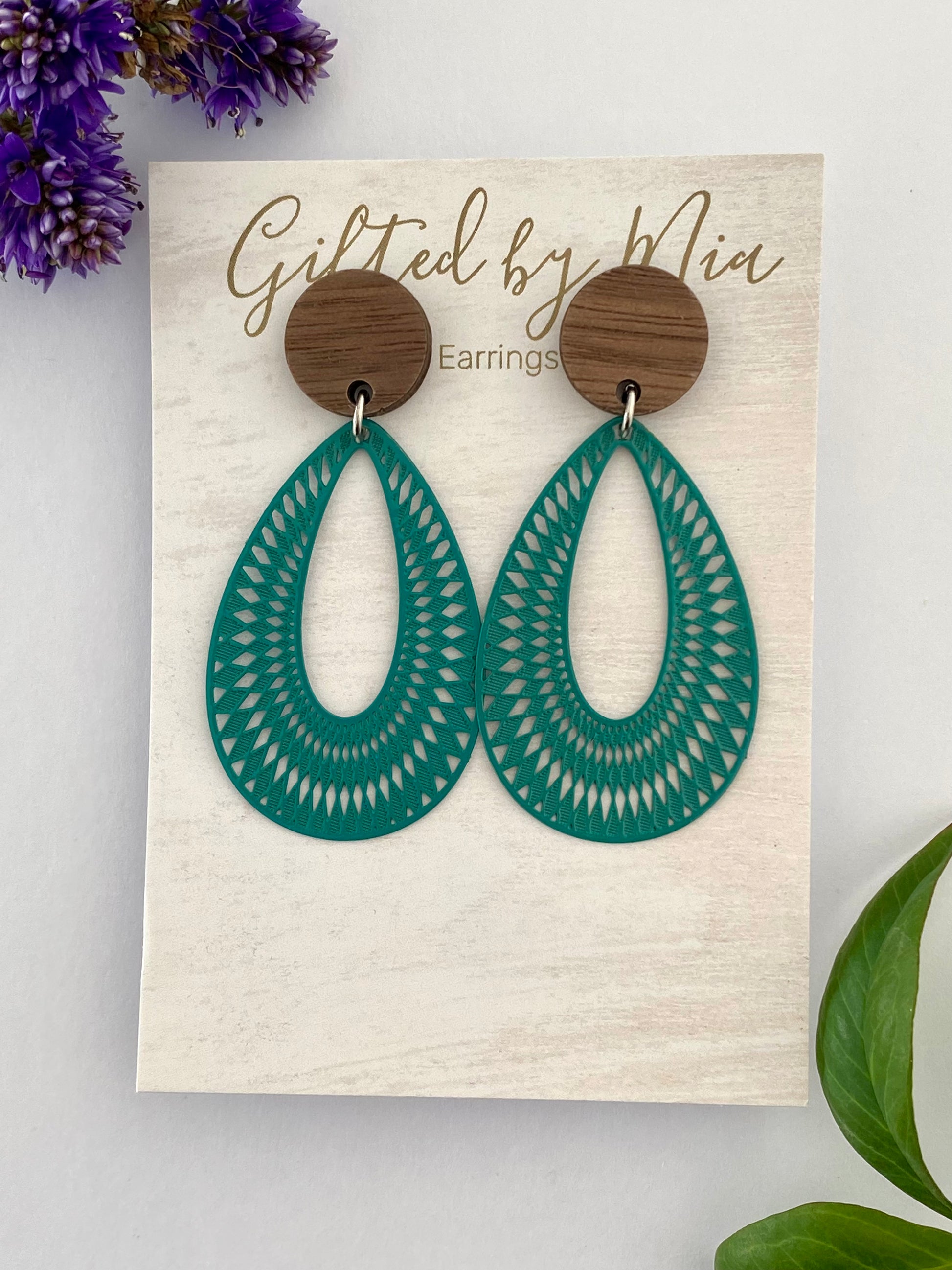 green filigree statement earrings